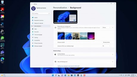 A picture that shows how to change your background in Windows 11 by changing the Background settings.