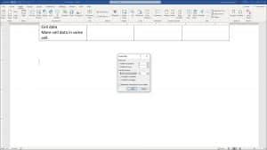 Create Tables in Word - Instructions: A picture of a user creating tables in Word by using the “Insert Table” dialog box.