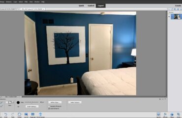 A picture of a user making a selection with the Quick Selection Tool in Photoshop Elements.