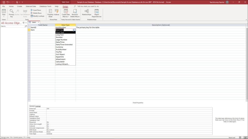 Create Tables in Access: A picture of a user creating a new table in table design view in Access.
