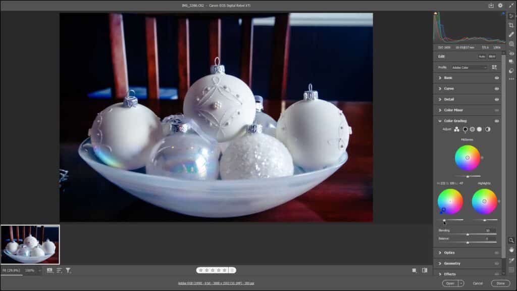 A picture of a user applying a color to a selected tonal range using the Color Grading panel in Camera Raw in Photoshop.