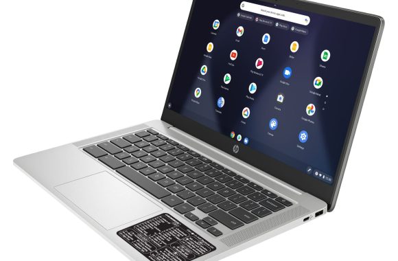 chromebook-keyboard-shortcuts-sticker-black-silver-chromebook A picture of the Chromebook Keyboard Shortcuts sticker affixed to a silver laptop.