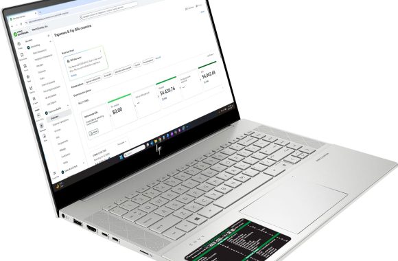 quickbooks-online-keyboard-shortcuts-sticker-black-silver-laptop A picture of the QuickBooks Online Keyboard Shortcuts sticker affixed to a silver laptop.